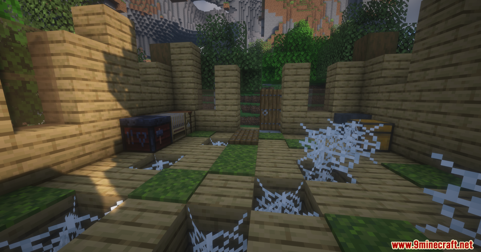 An abandoned wooden camp with cobwebs and chests in a forest