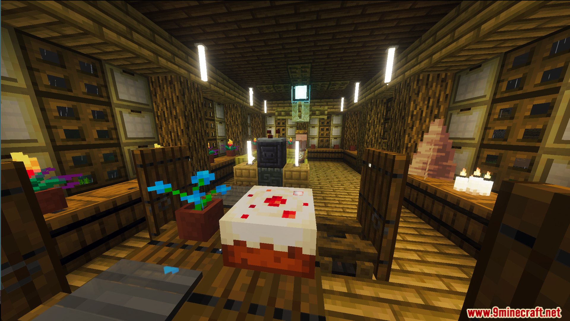 Interior of the Survival Filo House 20 Map with a cake and wooden chairs
