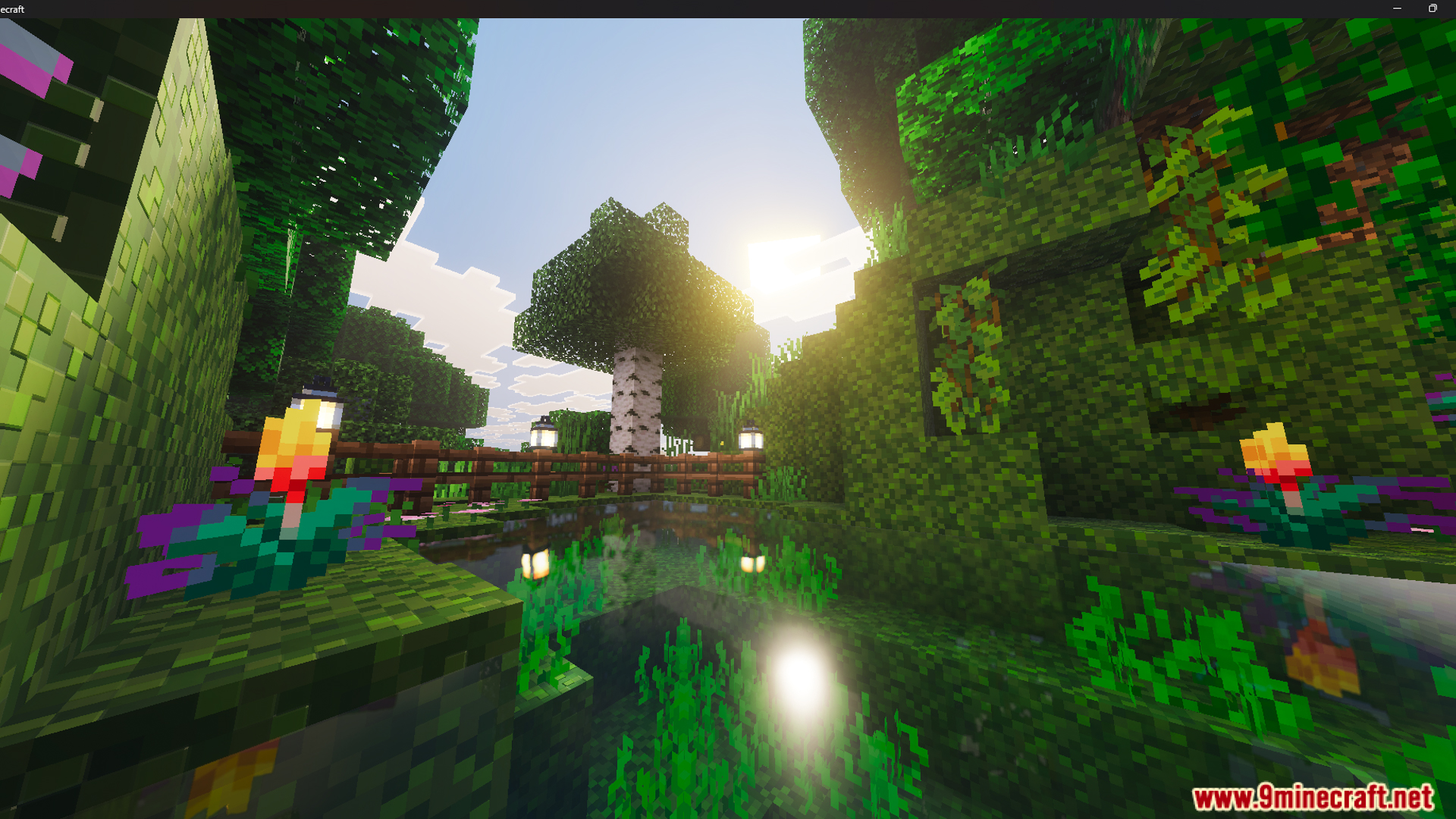 Lush garden pond with a small wooden bridge and glowing outdoor lanterns