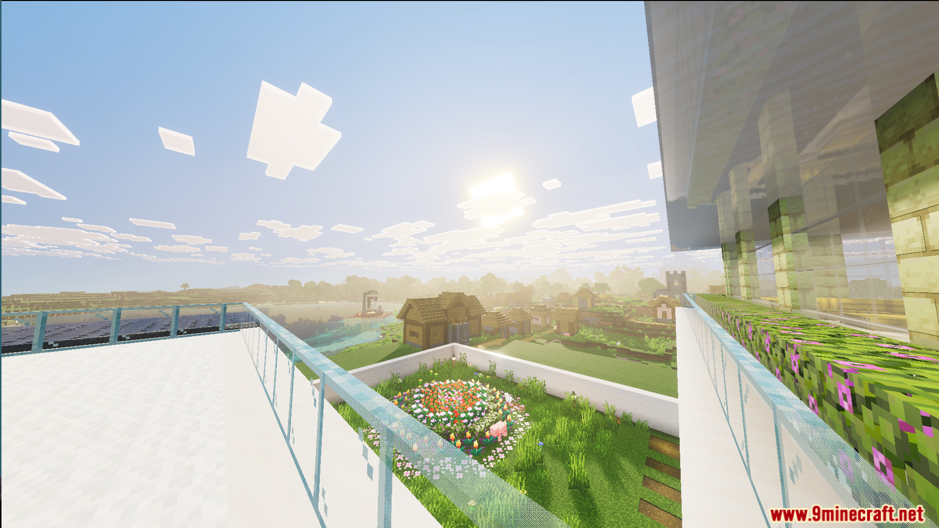 Survival Modern House 31 Map Screenshot 2 View from a glass balcony overlooking a flower garden and nearby village