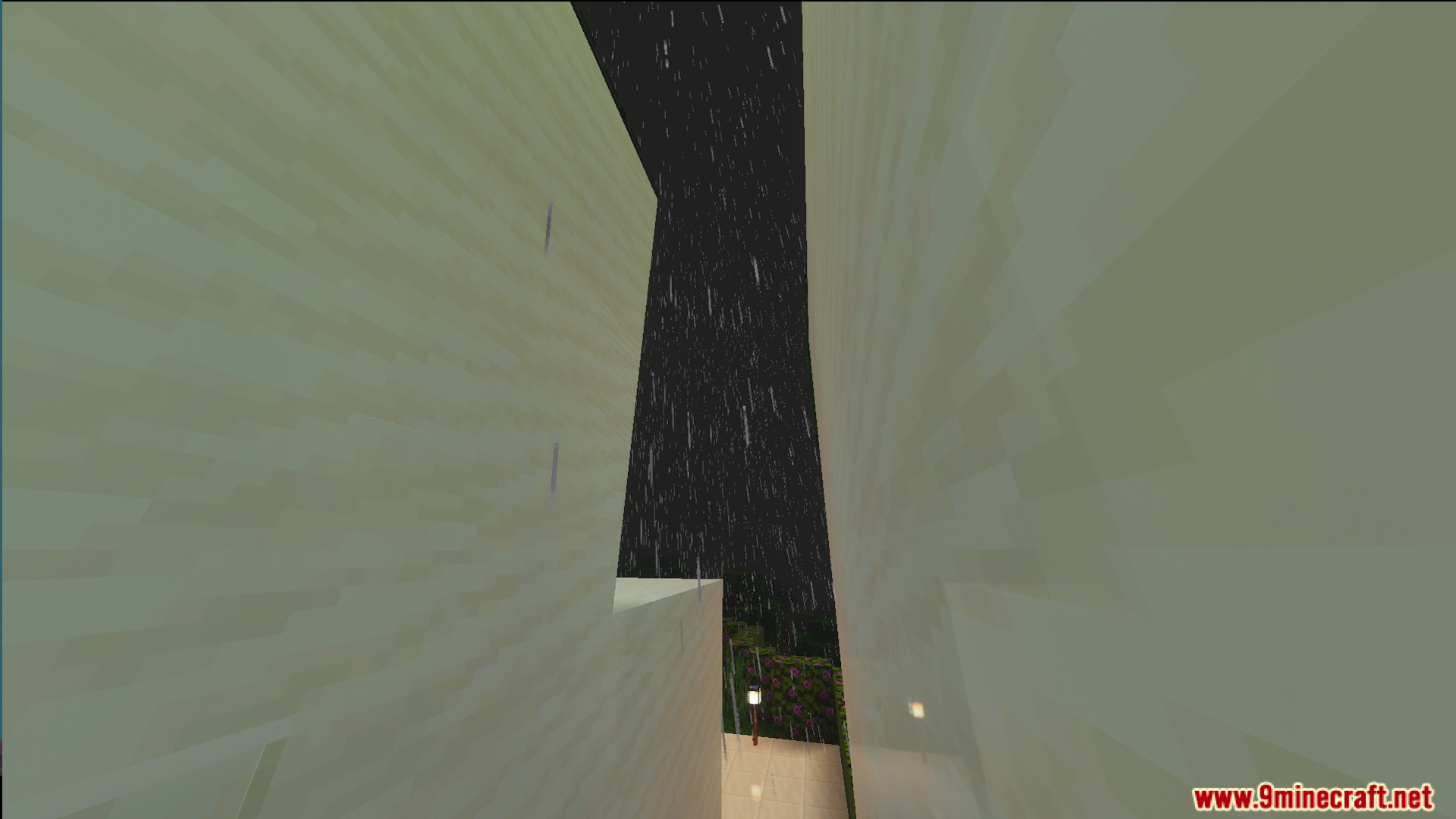Exterior view looking up at white walls during a rainy night in Minecraft