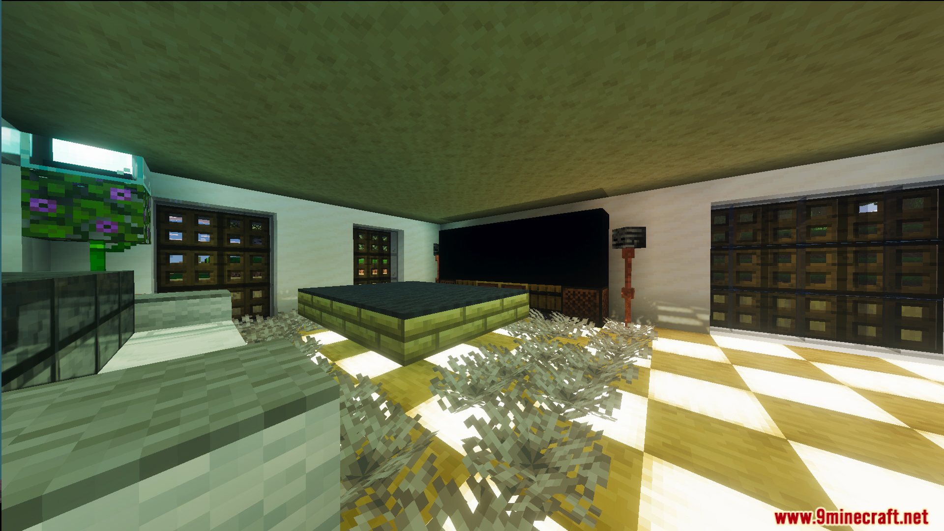 Fully decorated modern interior with a large screen and glowing floor blocks