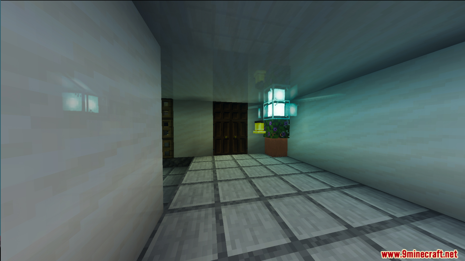 Modern interior featuring white walls tiled floors and a glowing decorative light block