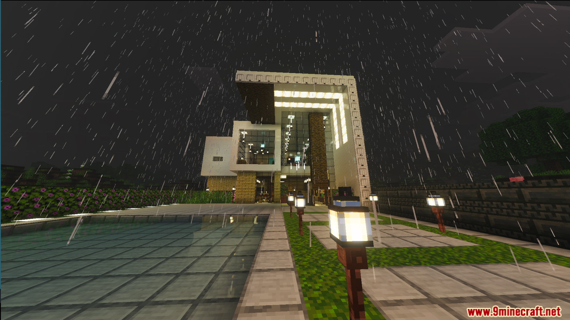 Modern house exterior with bright lanterns and glass windows in the rain