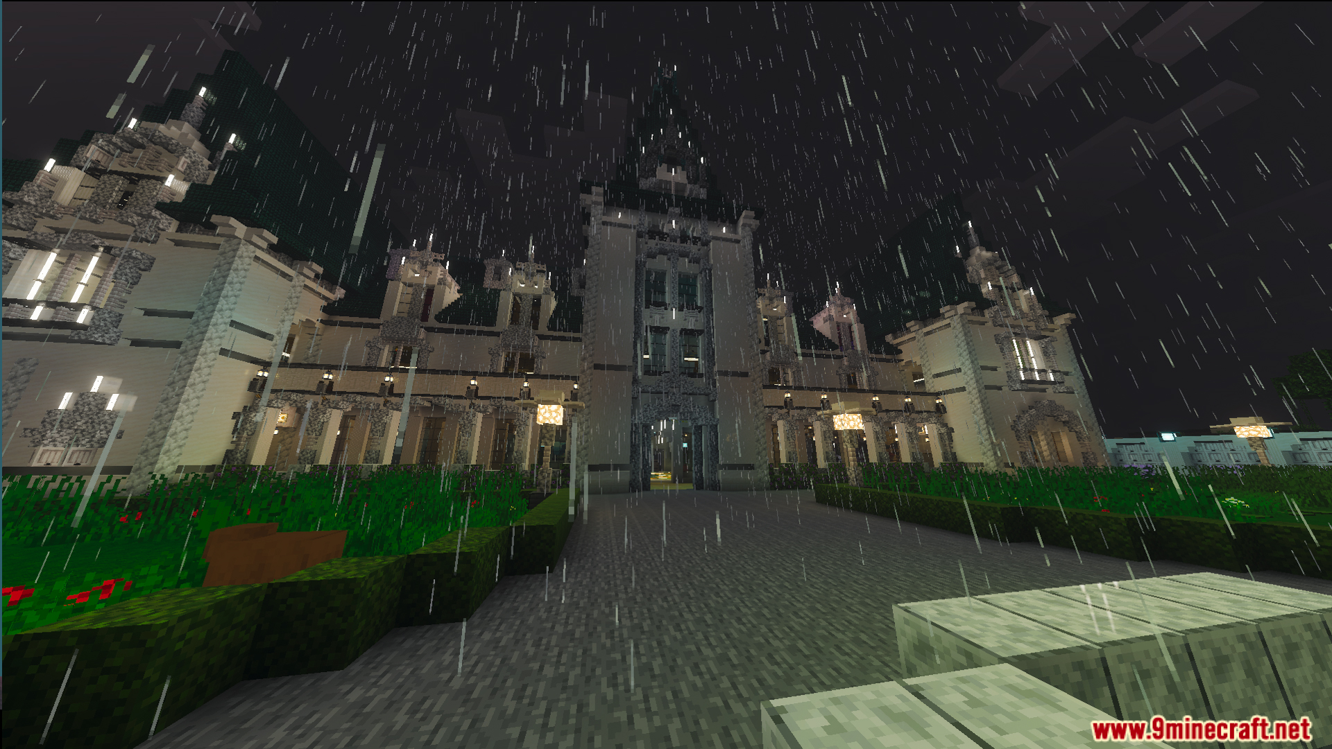 Exterior of a massive white palace with green roofs during a rainy night