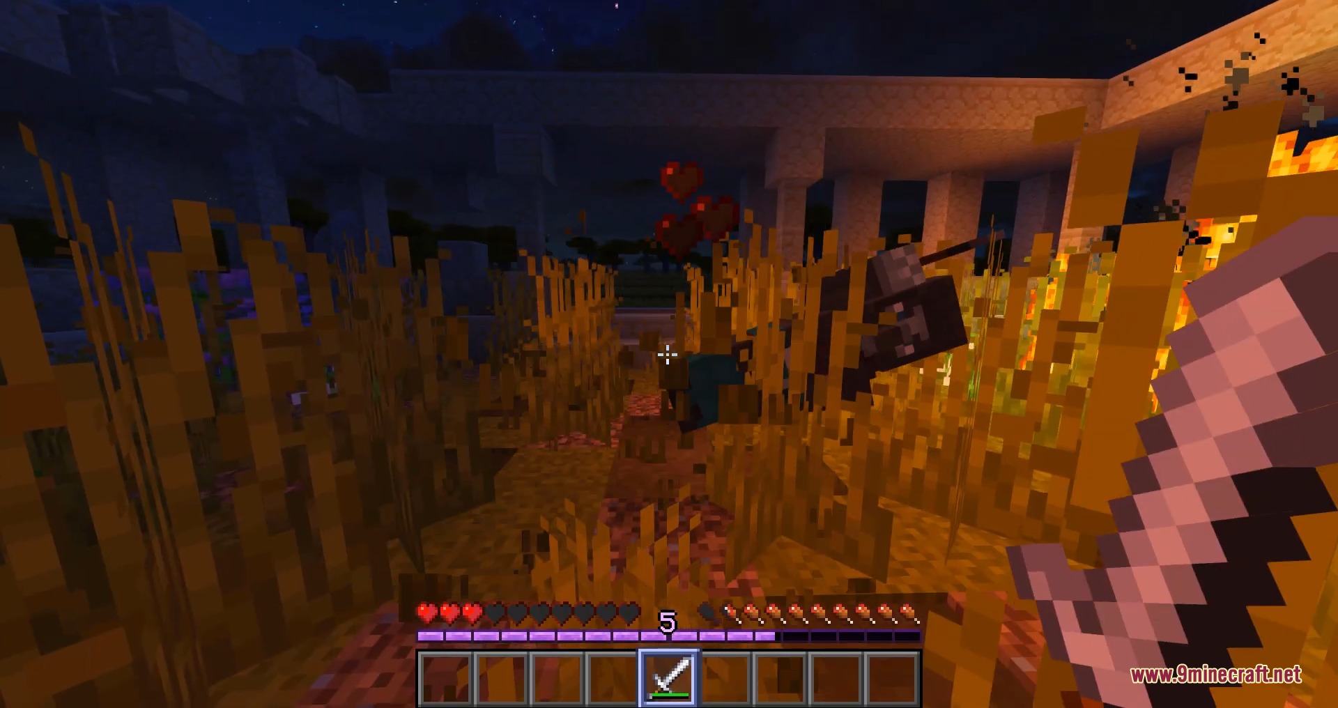 The Swing Through Grass mod allows players to attack mobs through tall grass