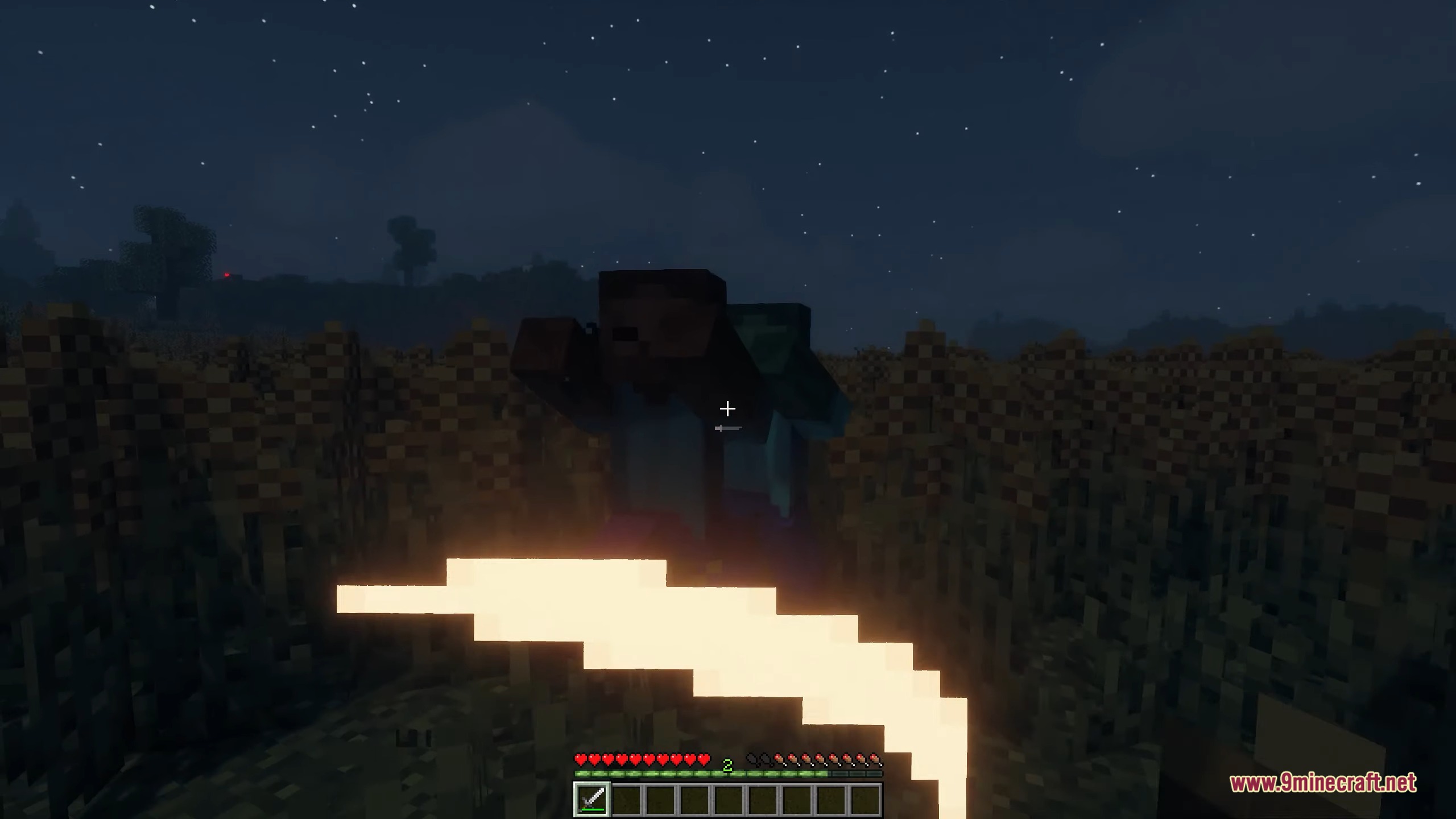 Swing Through Grass mod allows attacking mobs through tall plants and flowers