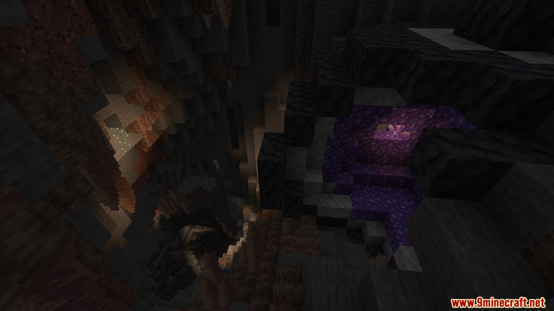 A dark cave view showing limited visibility without the night vision effect
