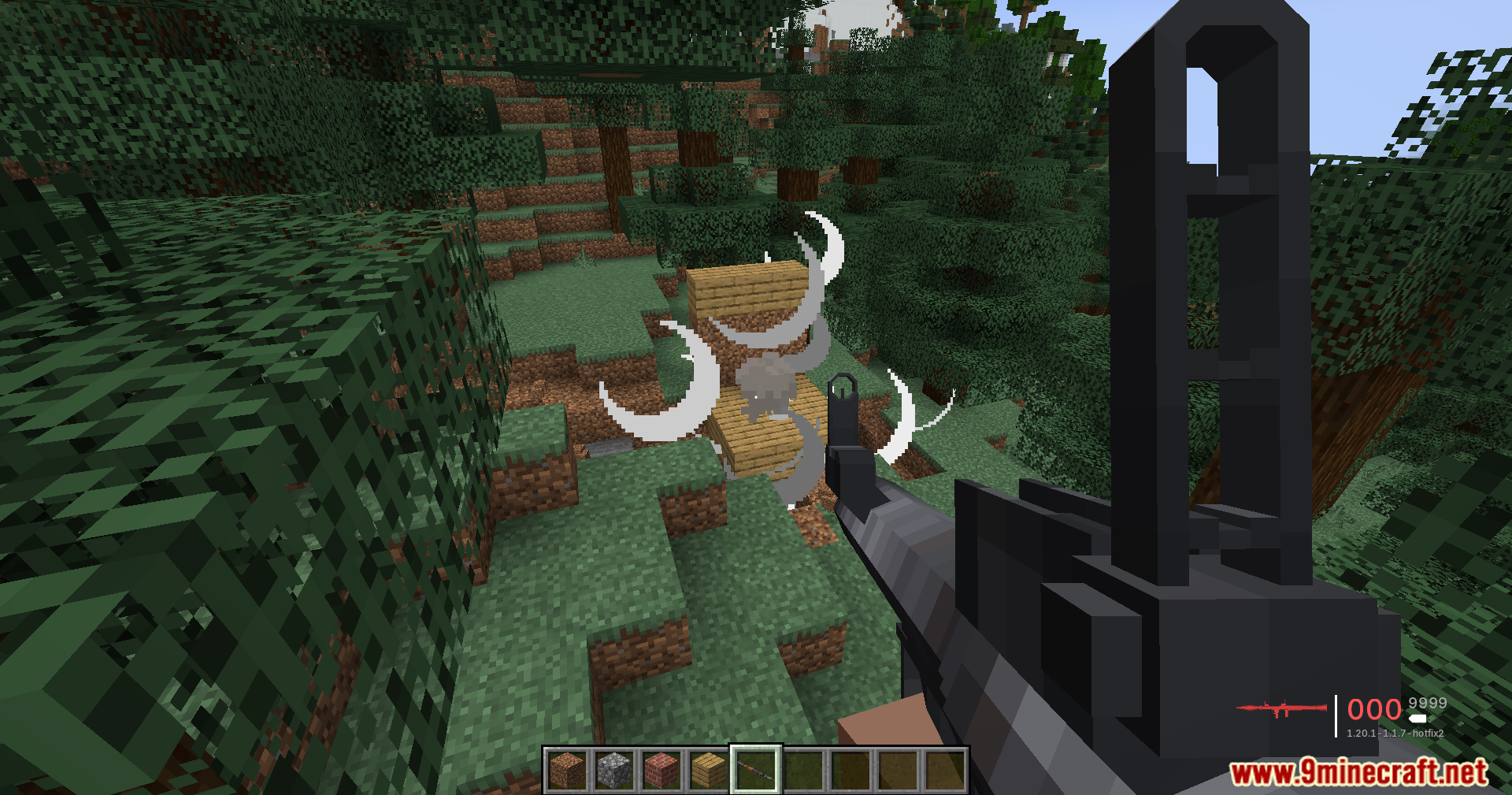 A player fires a gun at wooden blocks causing a large white explosion