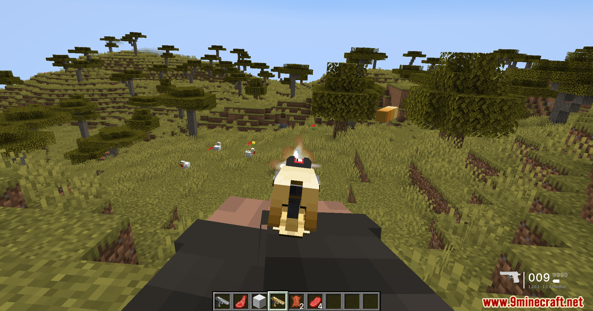 TaCZ Optimization Mod Screenshot 10 Player aiming a tan pistol at chickens in a savanna biome during daytime