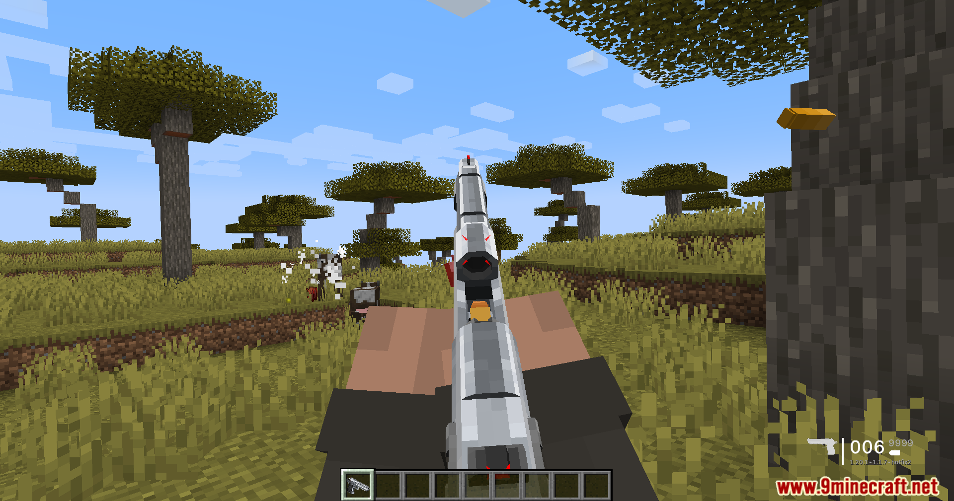 TaCZ Optimization Mod Screenshot 3 A player aims a silver handgun in a savanna with flying bullet casings