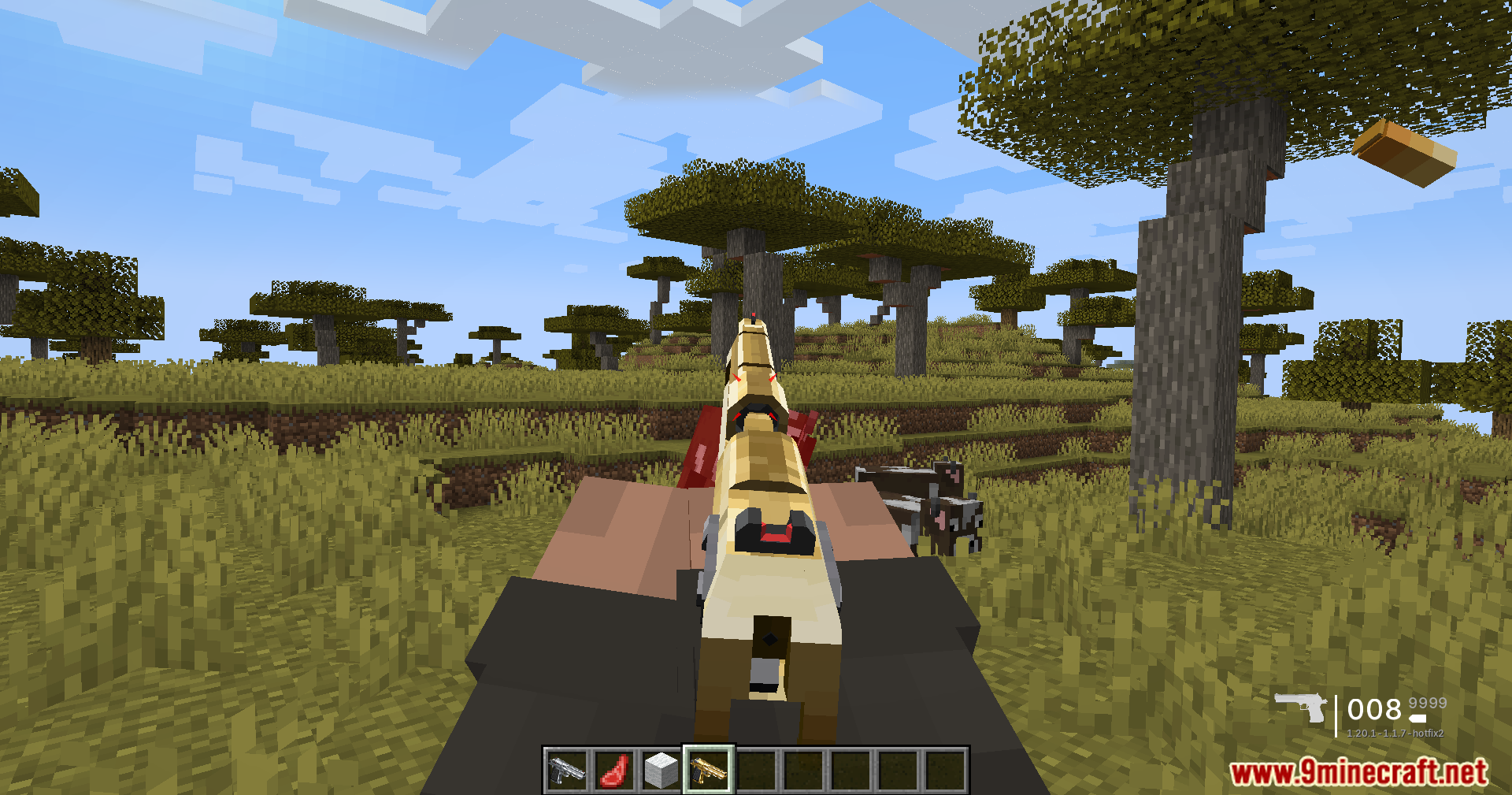 TaCZ Optimization Mod Screenshot 7 First person view of a player aiming a golden gun in Minecraft