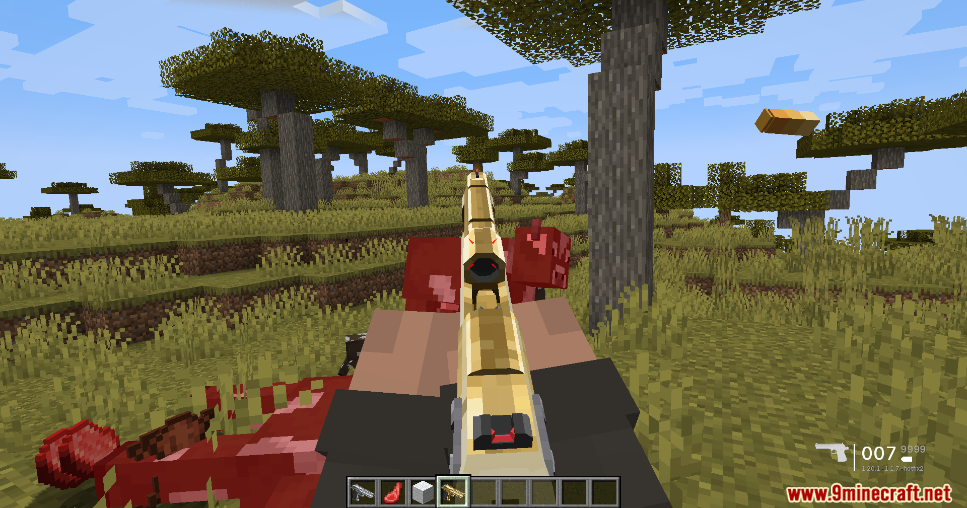 TaCZ Optimization Mod Screenshot 8 A player shooting a cow with a golden gun in Minecraft savanna