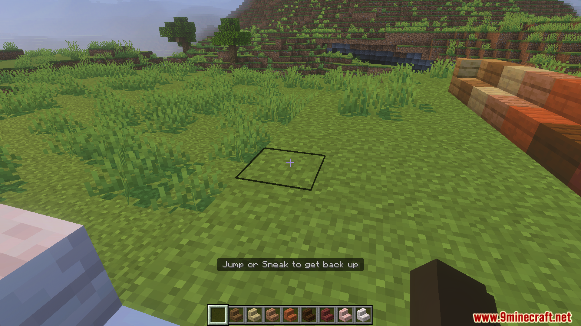 First person view of a player sitting with a prompt to get up
