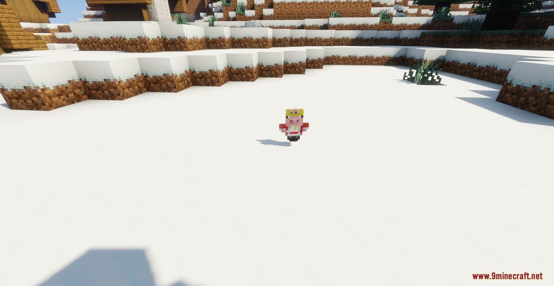 A small pig king totem sitting on a white snowy landscape in Minecraft