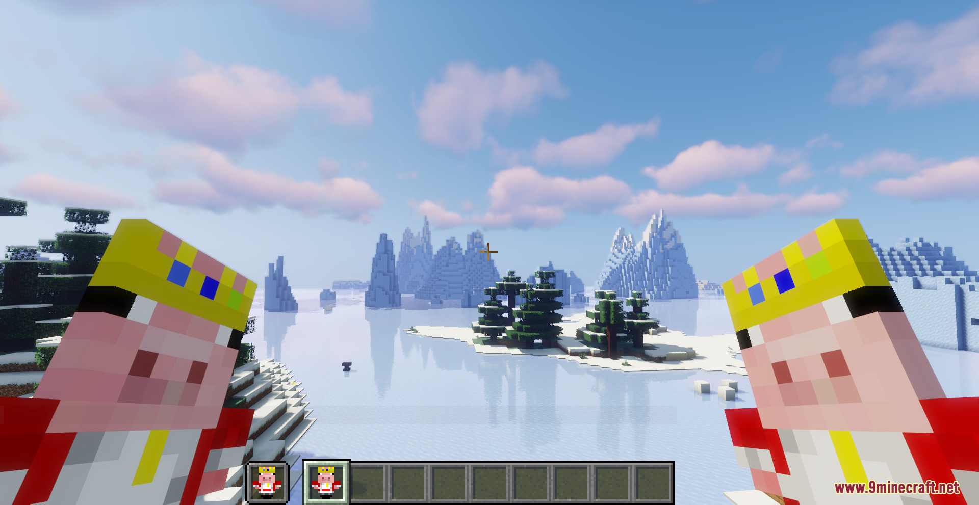 Player holding two Technoblade totems in a snowy biome with ice spikes
