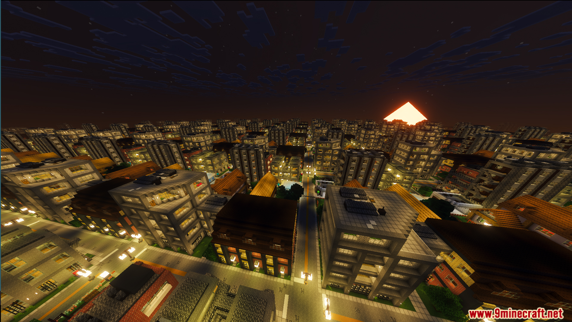 Aerial view of repeating streets and identical apartment buildings stretching into the distance