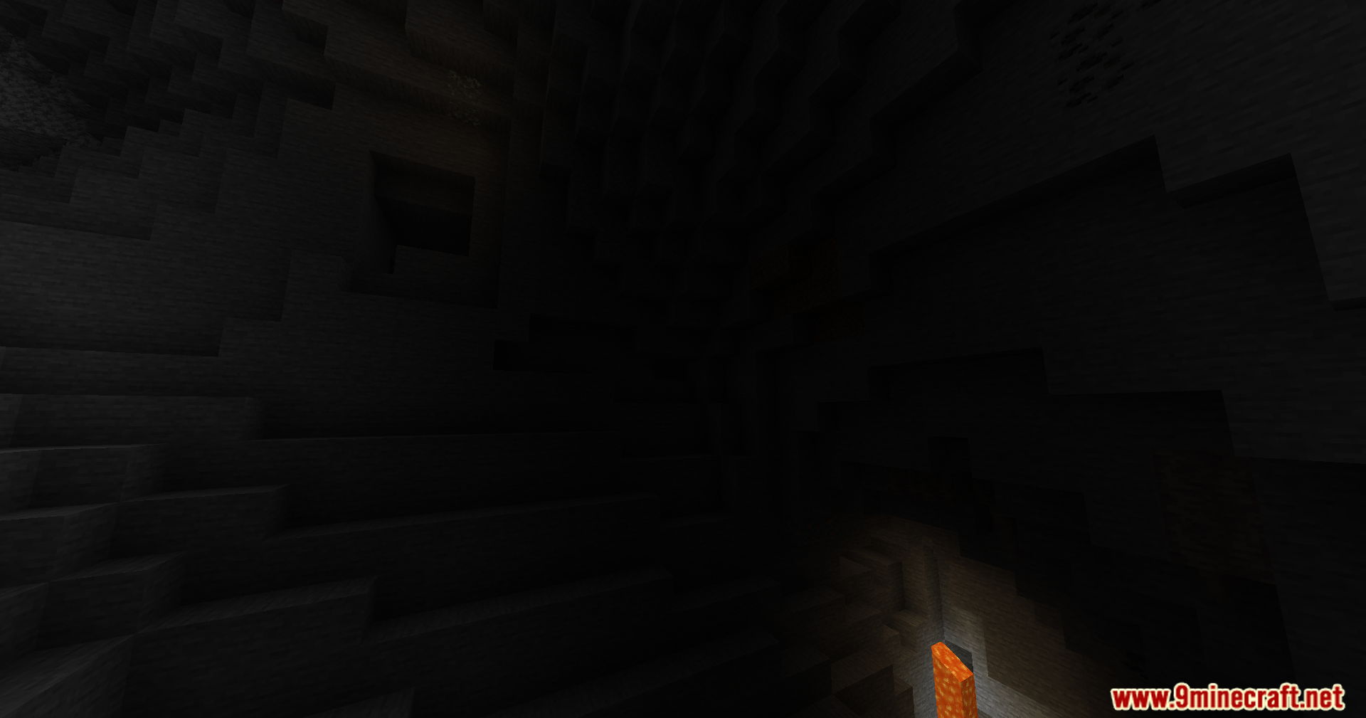 The Nofog Mod Screenshot 7 A dark underground cave with a small lava source glowing in the corner
