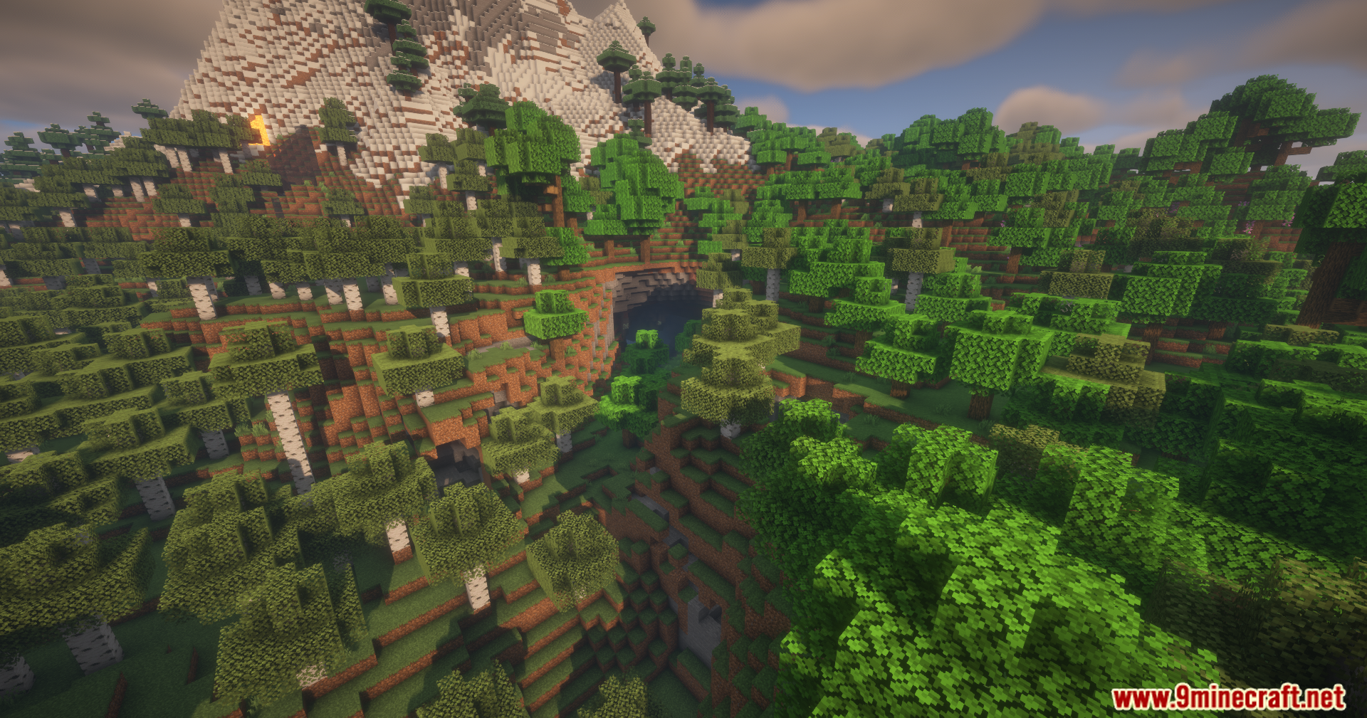 Thread Tweak Reforged Mod Screenshot 9 A scenic Minecraft landscape featuring a large mountain and lush green forests
