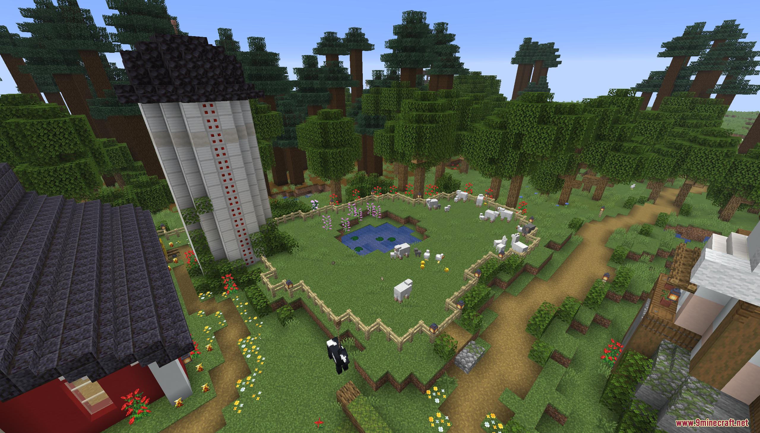 Tiny Takeover Farmstead Map Screenshot 6 A tall silo and a fenced animal pen with sheep on a farm