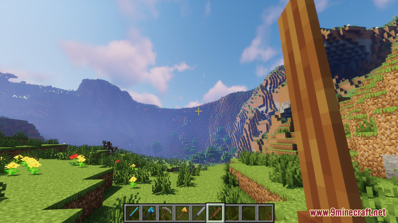 Tools 3D Resource Pack Screenshot 11 Player holding a detailed 3D wooden sword in a beautiful mountain biome