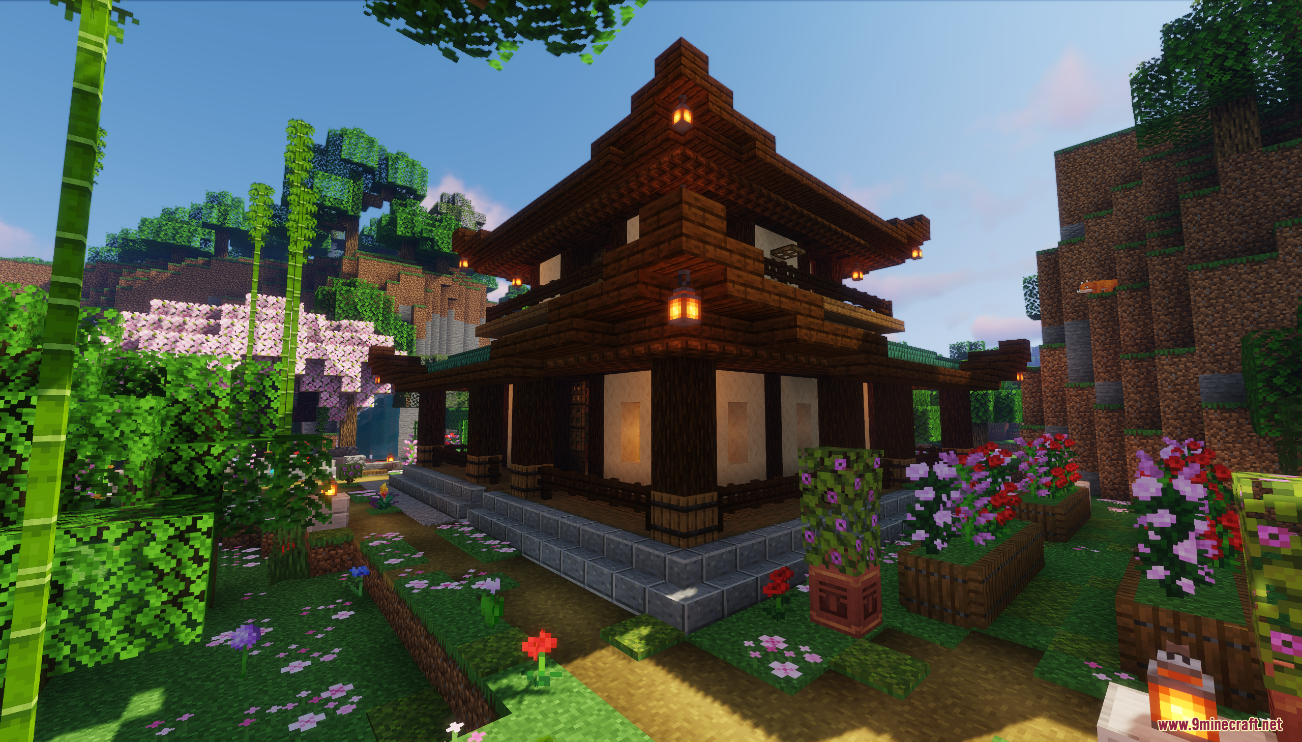 A traditional Japanese house with dark wood walls and a beautiful flower garden