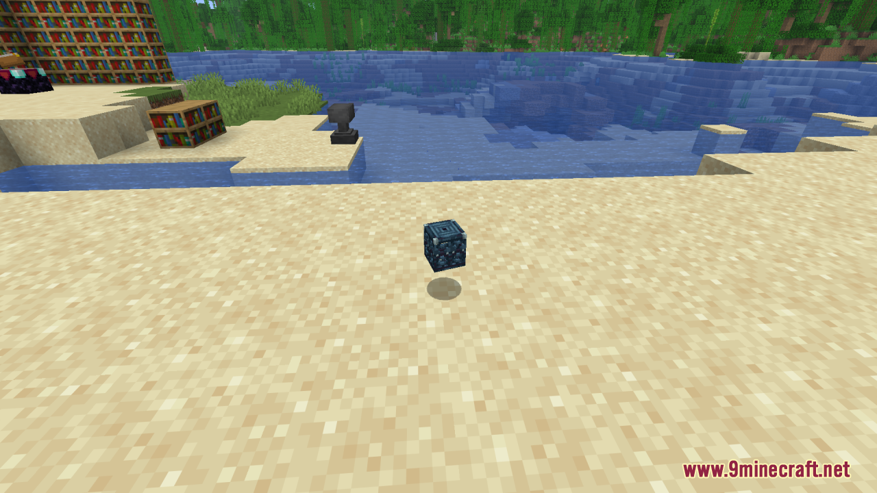 A small 3D trial spawner item floats above the ground on a beach