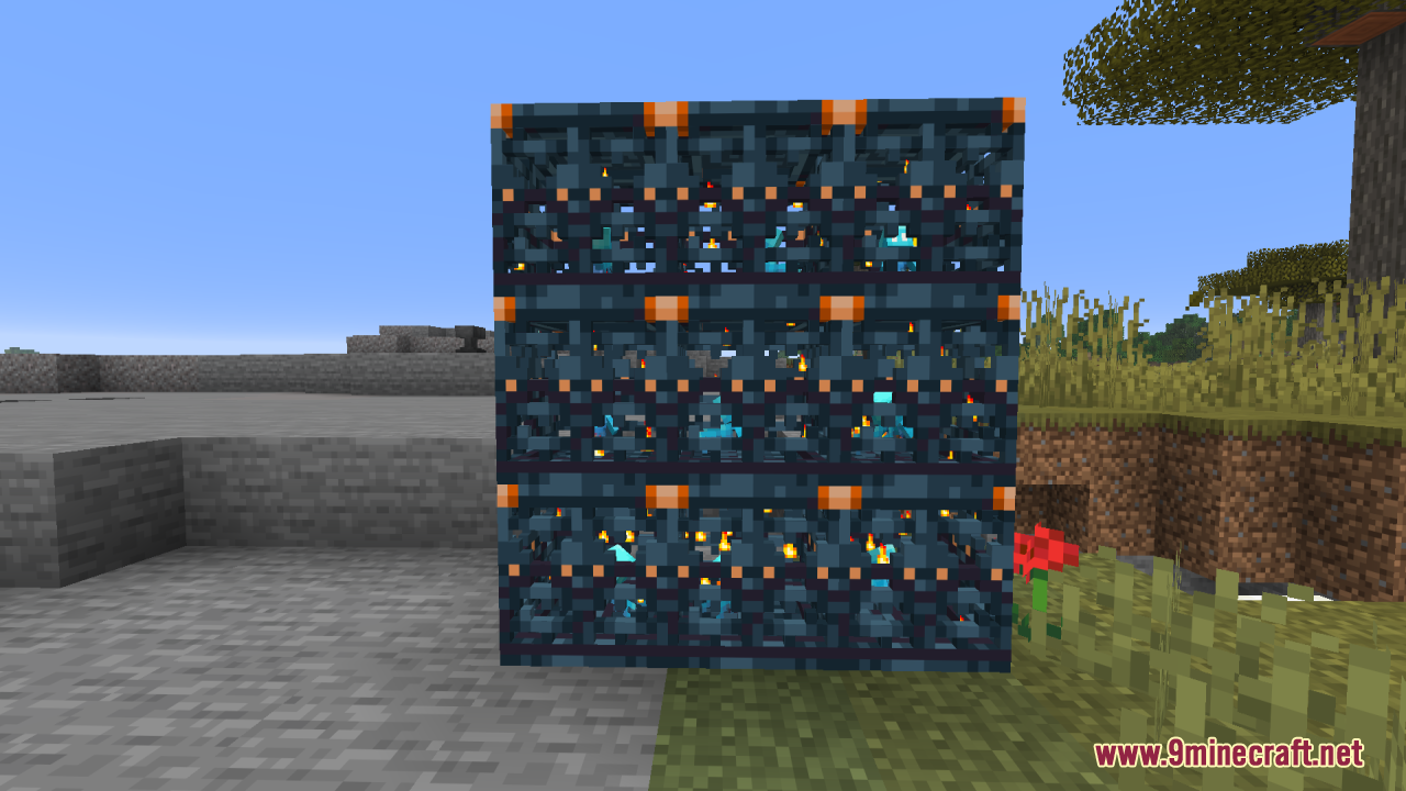 A wall of nine Undopia 3D trial spawners stacked together in a field