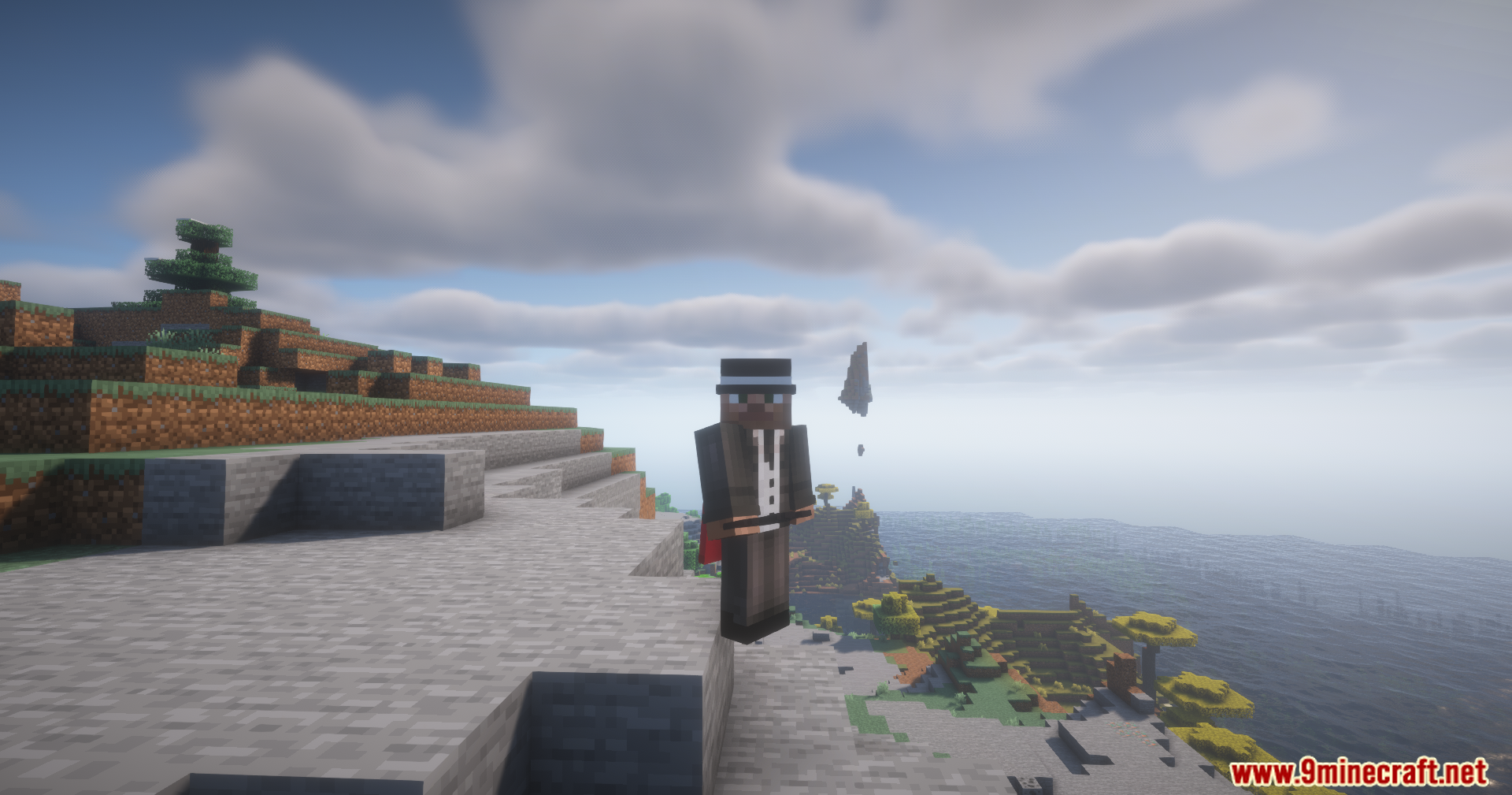 Utility Vest Mod Screenshot 8 A player character wearing a vest stands on a cliff overlooking the ocean