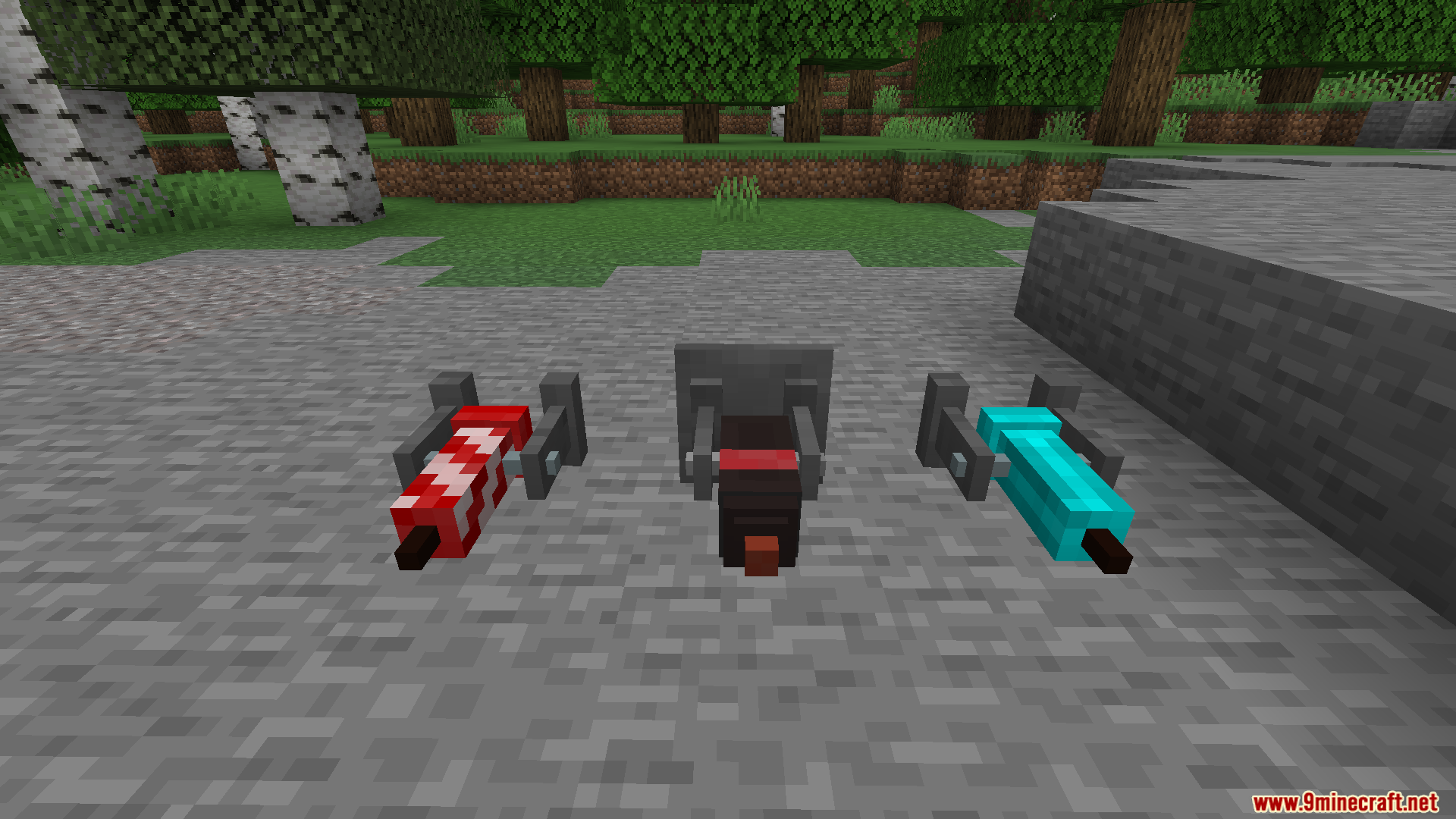 Valkyrien Skies Tournament Reforged Mod Screenshot 7 Three small mechanical thrusters in different colors placed on the ground