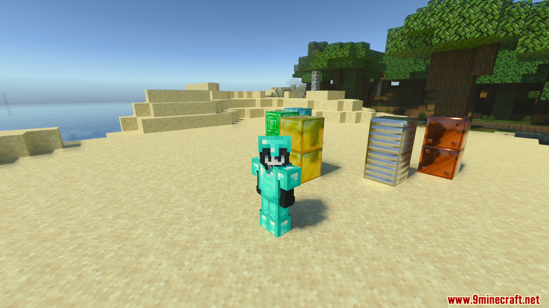 Player wearing diamond armor standing near reflective resource blocks on a sandy beach
