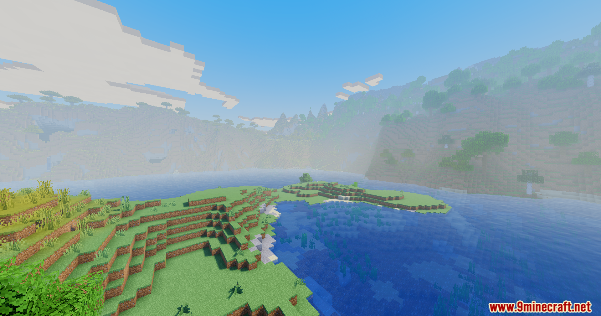Bright Minecraft landscape with a lake and hills using Vanilla Remake Shaders Mod