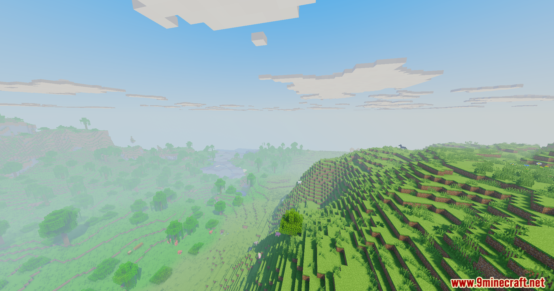 Vanilla Remake Shaders Mod showcases vibrant green hills and blocky clouds