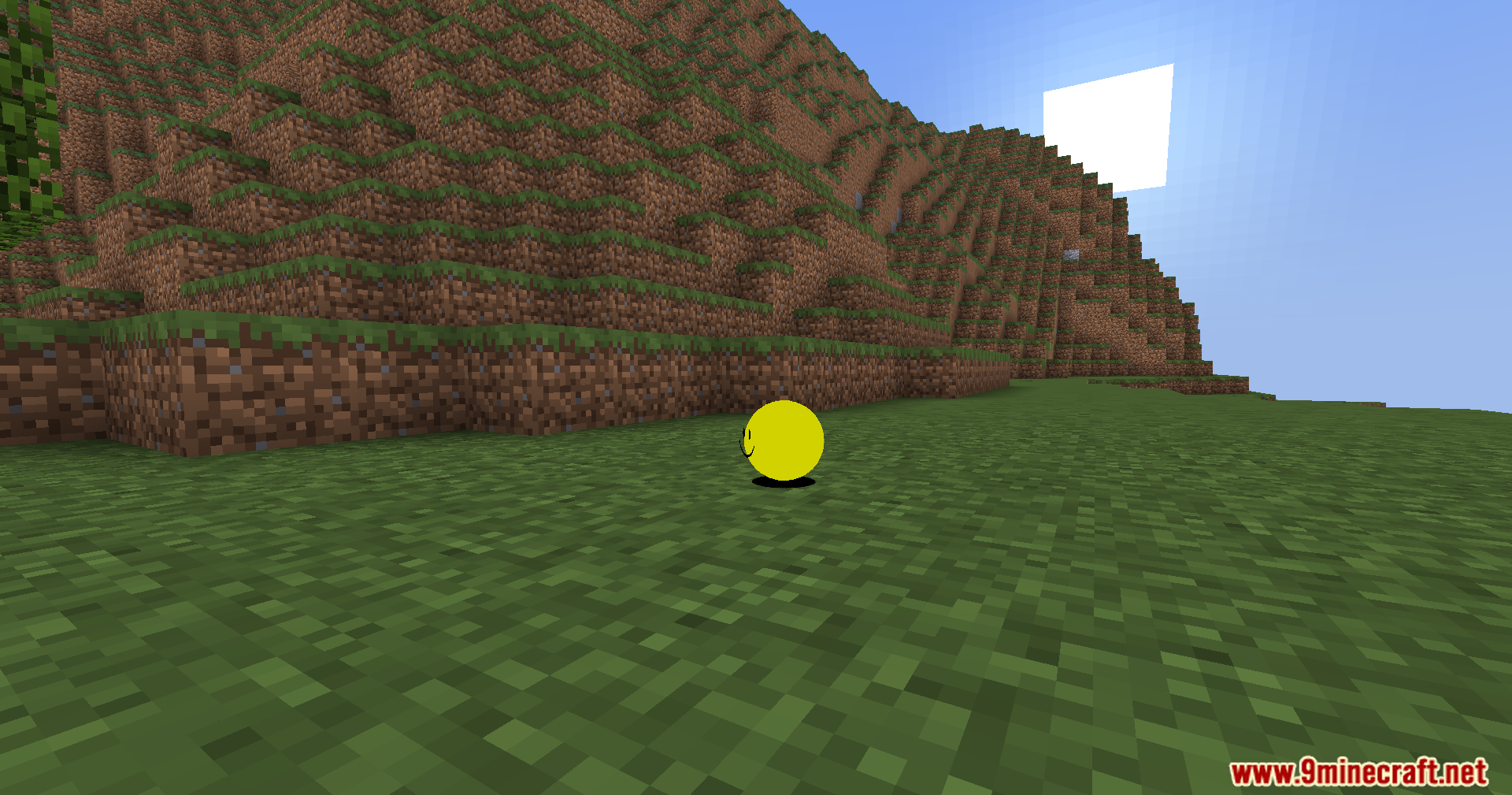 Verity Shaders Screenshot 2 A round yellow sphere with a face stands in a hilly landscape