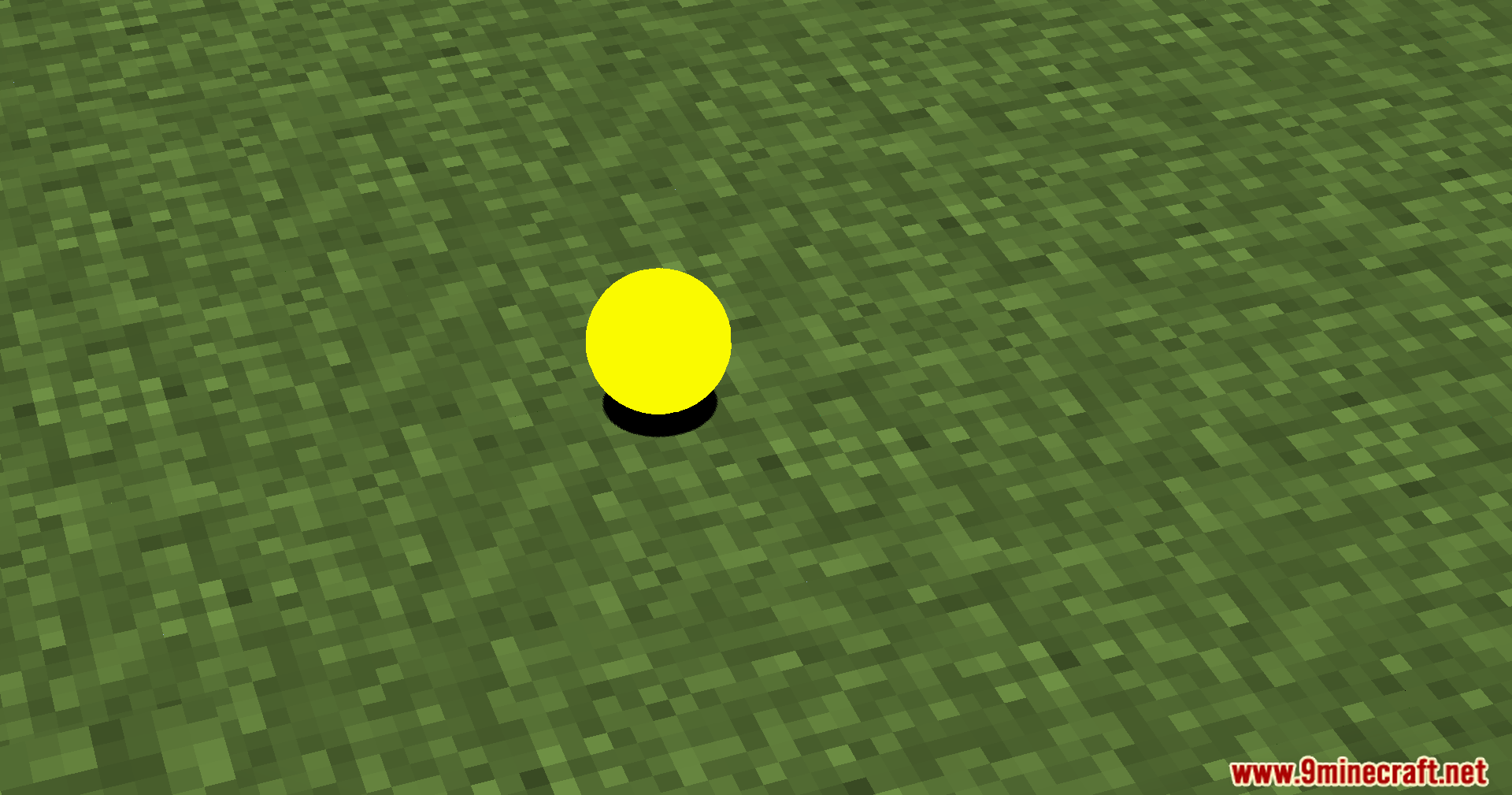 Verity Shaders Screenshot 3 A perfectly round yellow sphere sits on a grass block in Minecraft