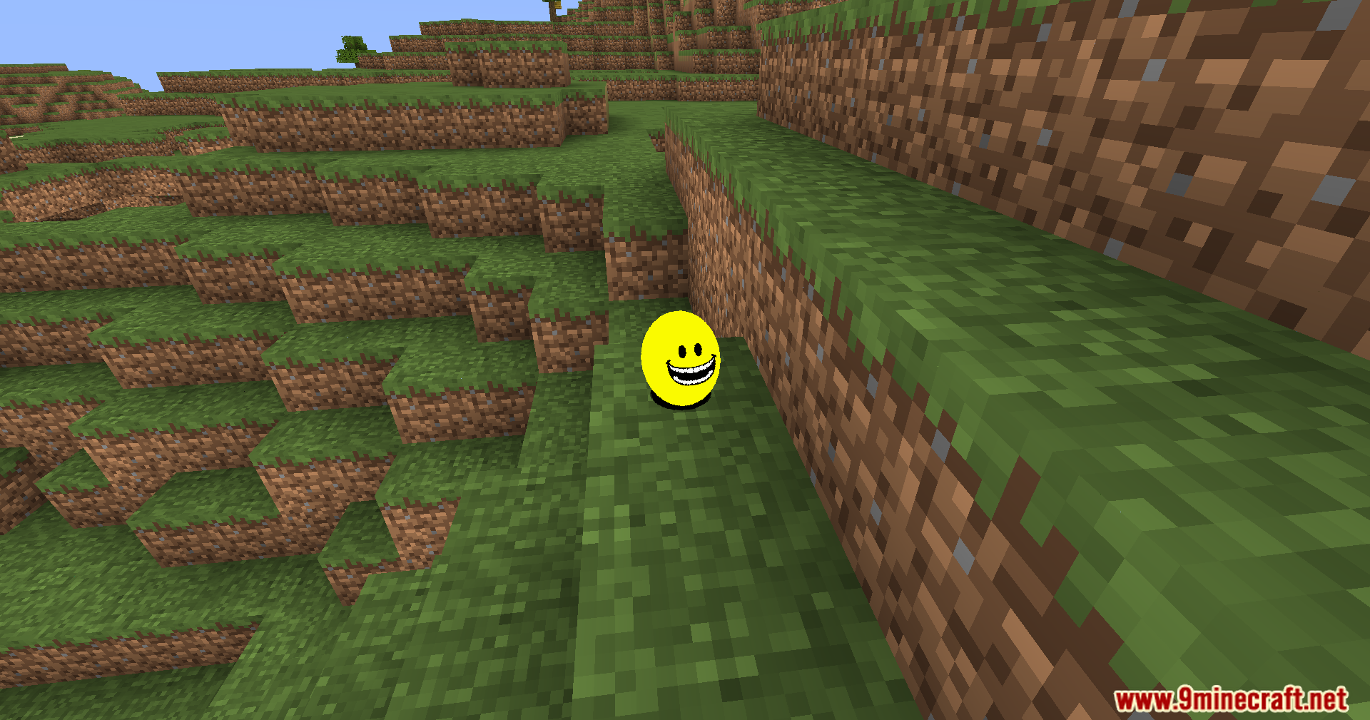 Verity Shaders Screenshot 4 A smooth yellow sphere with a smiling face sits on a grassy hill