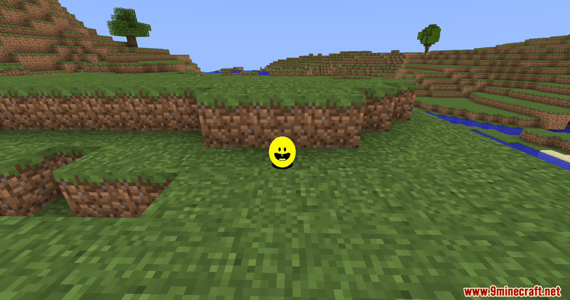 Verity Shaders Screenshot 8 The smiling yellow sphere rests on the grass near a dirt ledge