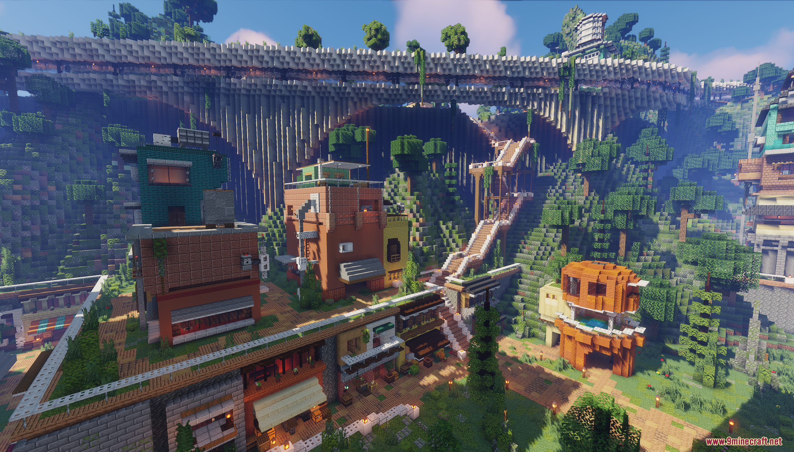 Vesta Verde Map Screenshot 6 A hillside Minecraft village with colorful buildings and a large stone bridge