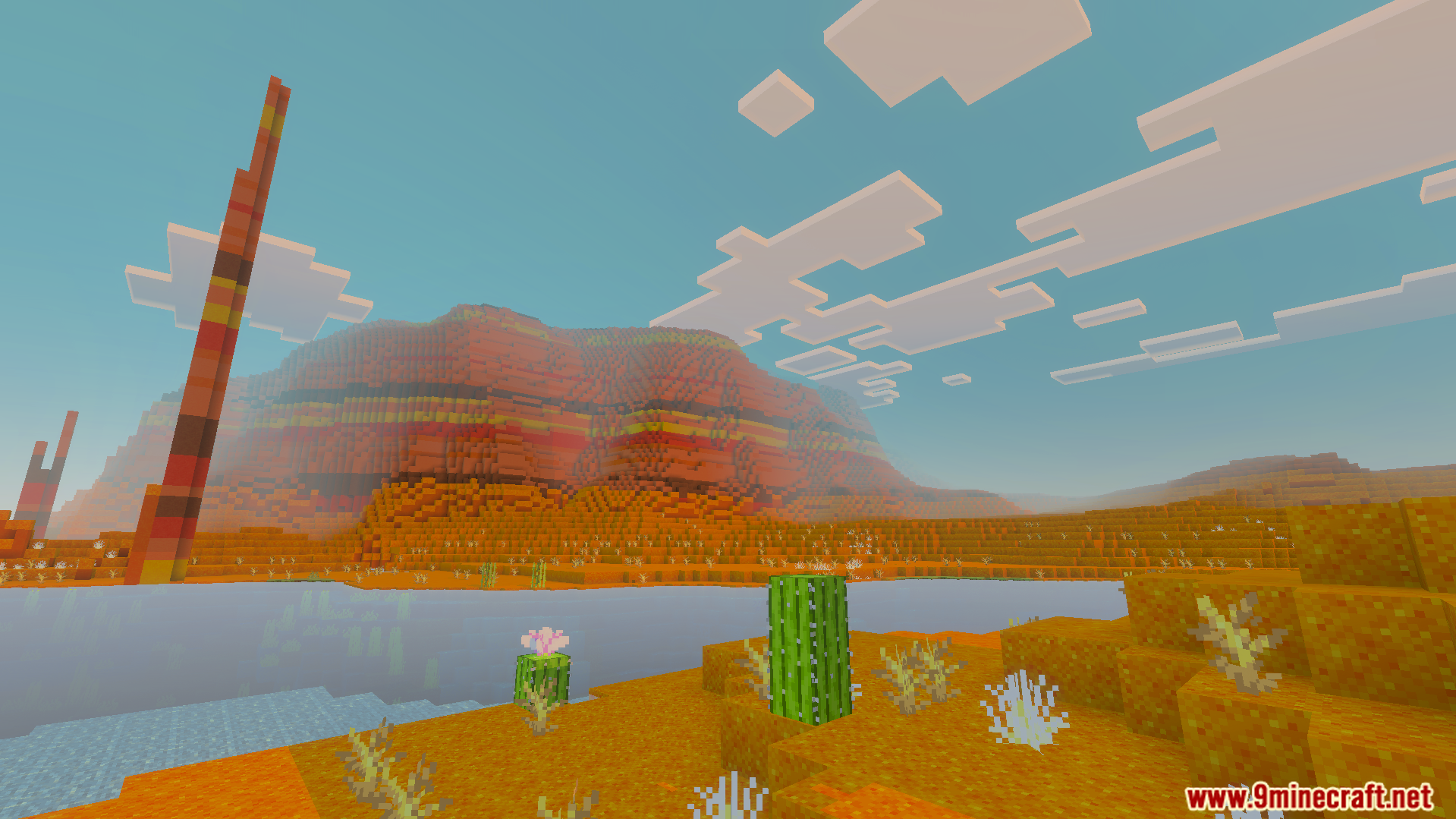 Warm sunset lighting over a mesa biome with terracotta mountains and cacti