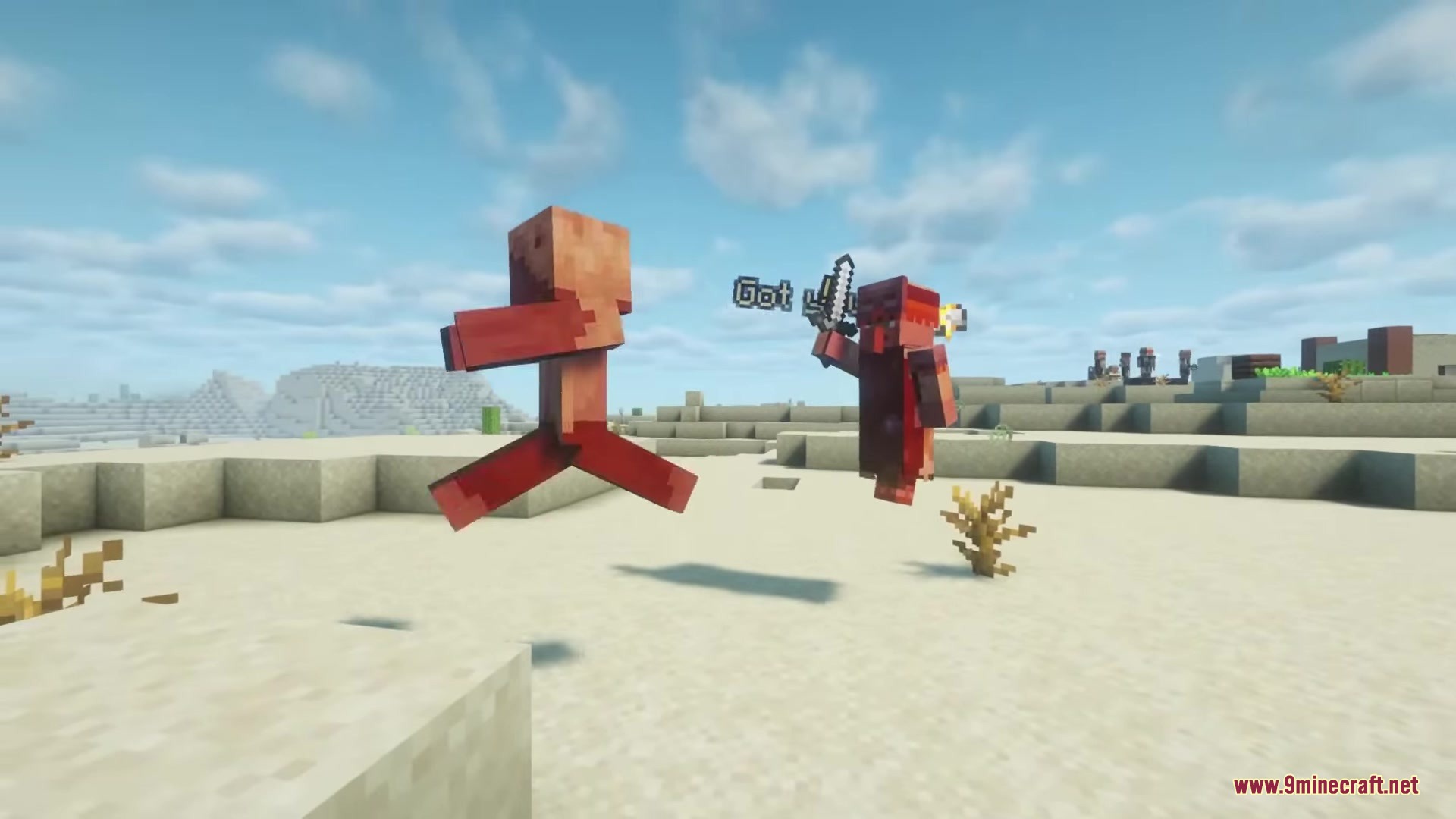 Villager Retaliation Mod Screenshot 11 Two red villagers jumping and fighting with a sword in the desert