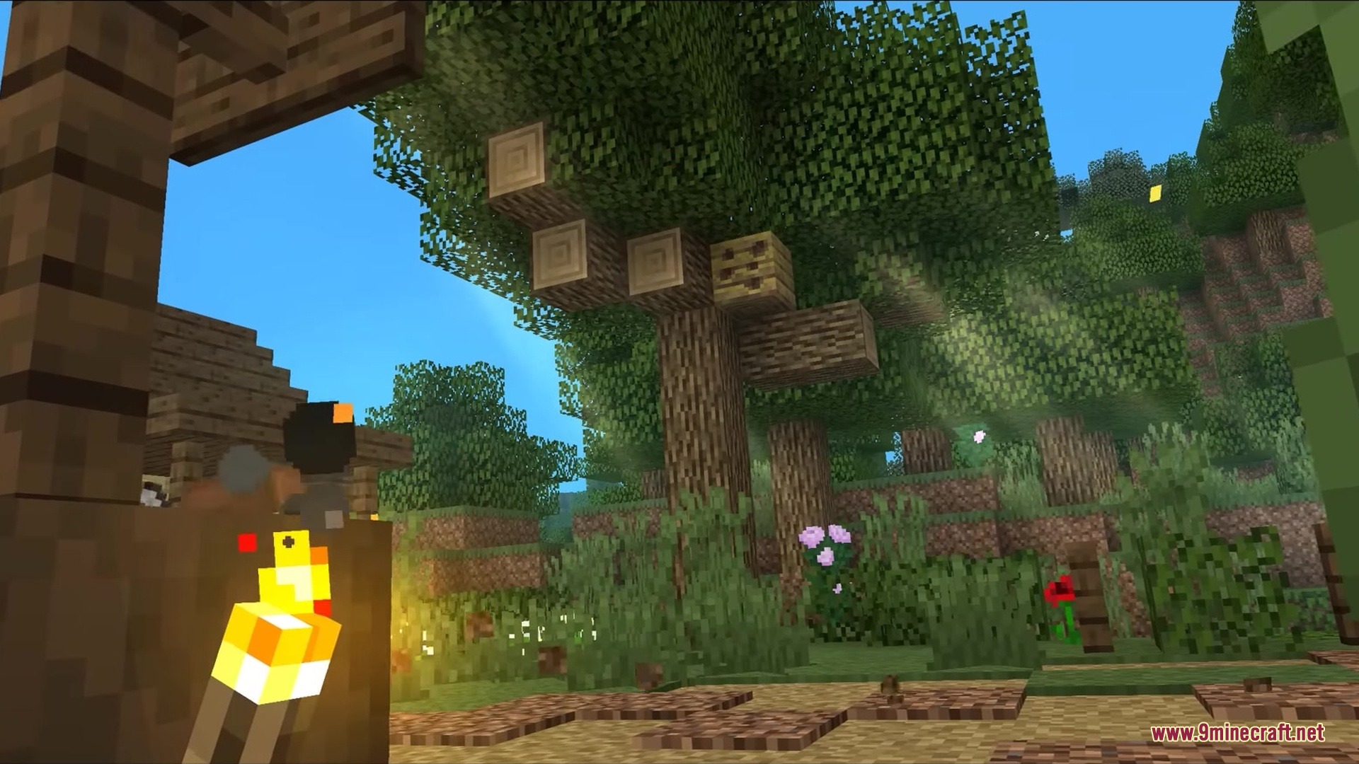 Vintage Resource Pack Screenshot 1 A large tree with visible log blocks stands in a sunny forest