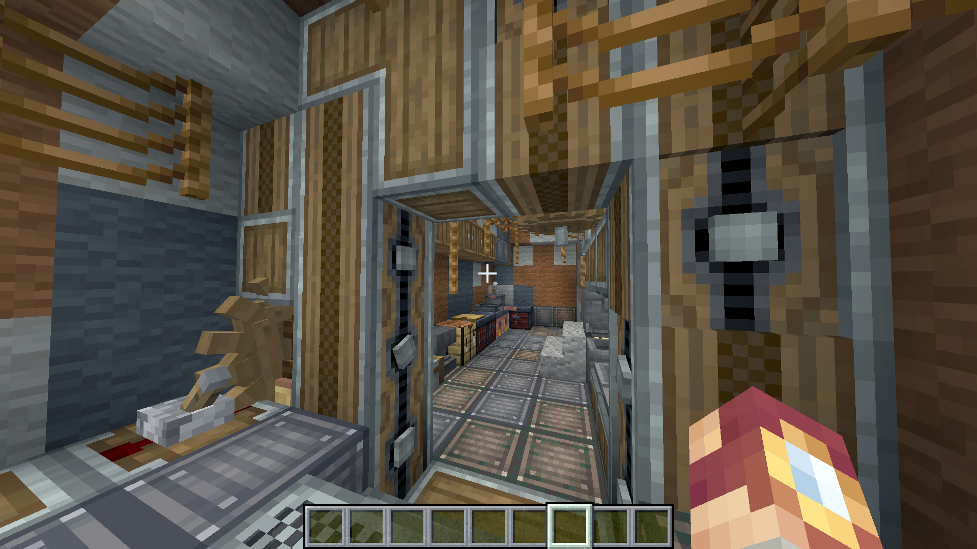 A player explores the mechanical interior of a compact truck and trailer base