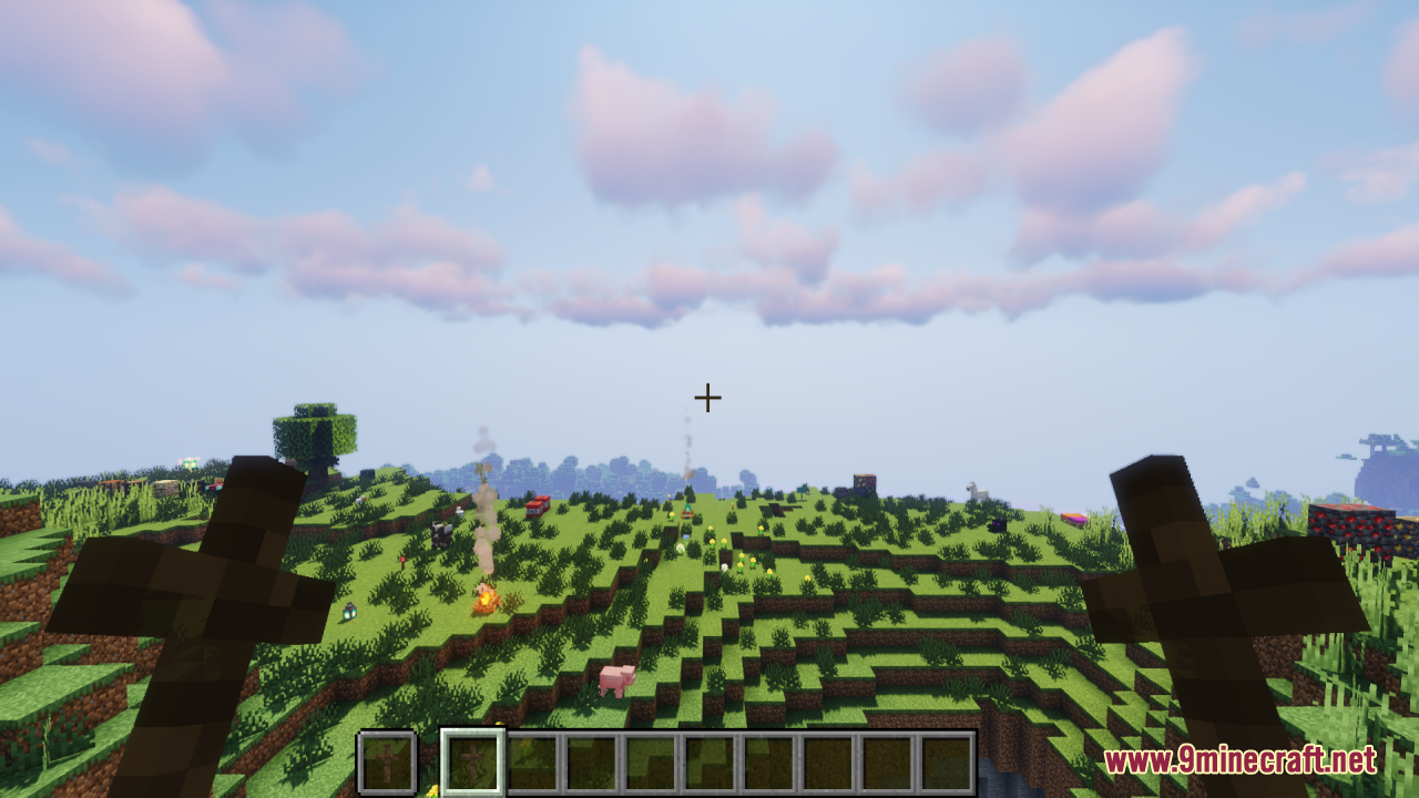 Wood Totem Cross Resource Pack Screenshot 10 A player holds two wooden crosses while looking at a vast green landscape