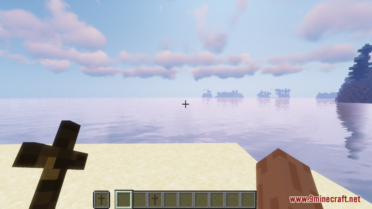Wood Totem Cross Resource Pack Screenshot 3 A player holds a wooden cross item while looking at the ocean