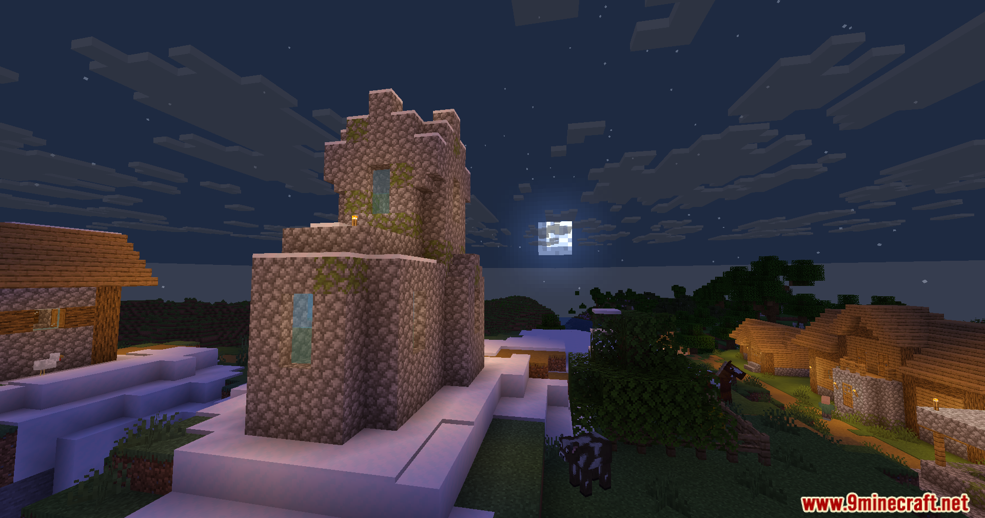 Wozt Vanilla Plus Shaders Screenshot 11 A cobblestone church stands in a snowy village under the bright night moon