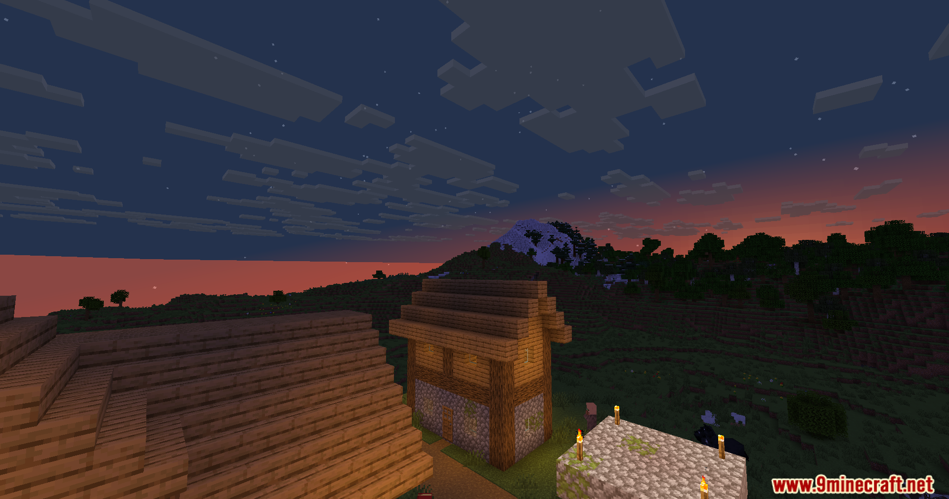 Wozt Vanilla Plus Shaders Screenshot 9 A village house and cobblestone structure under custom blocky clouds at sunset
