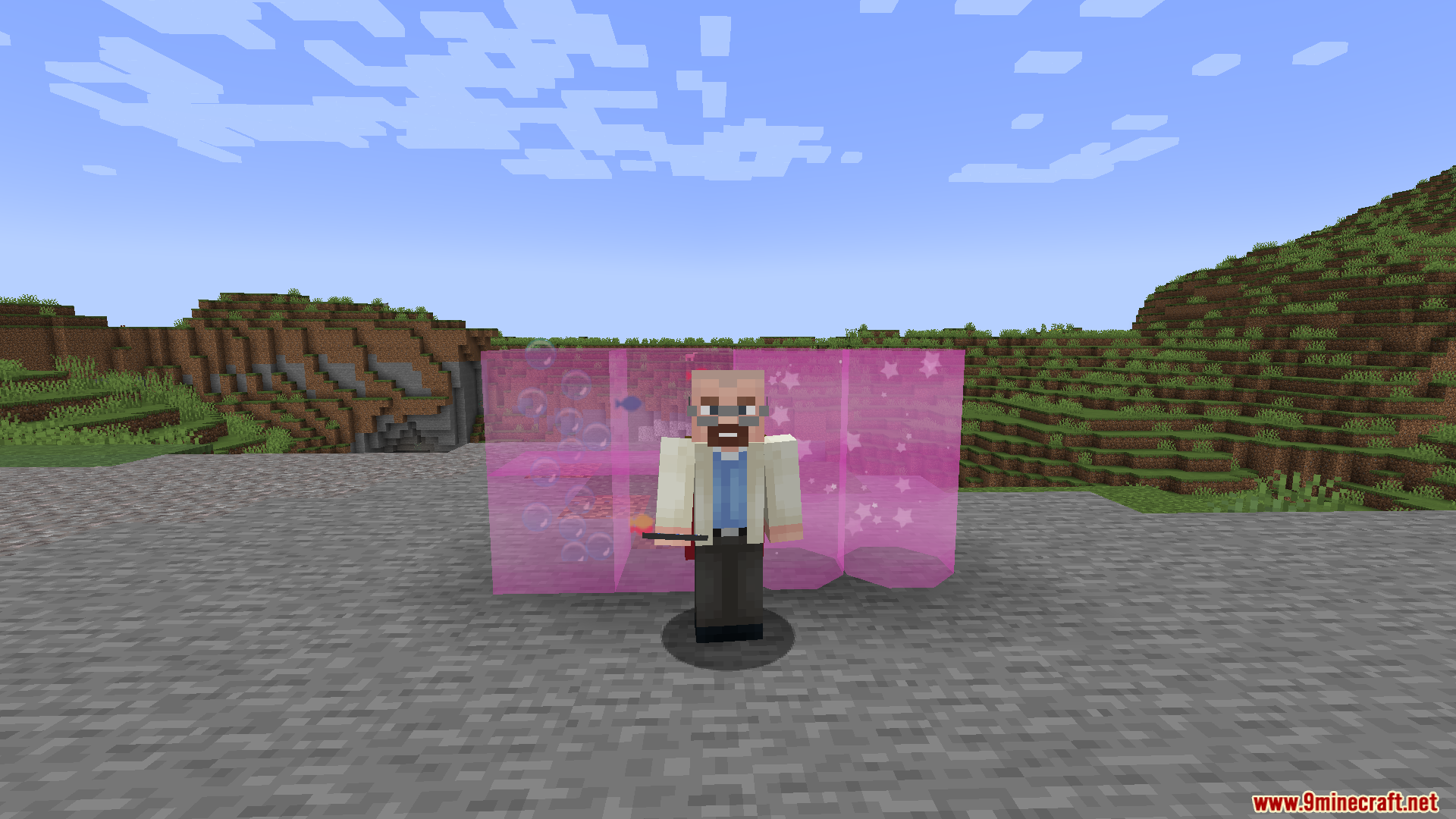 Scientist character stands in front of pink glass blocks containing fish and bubbles