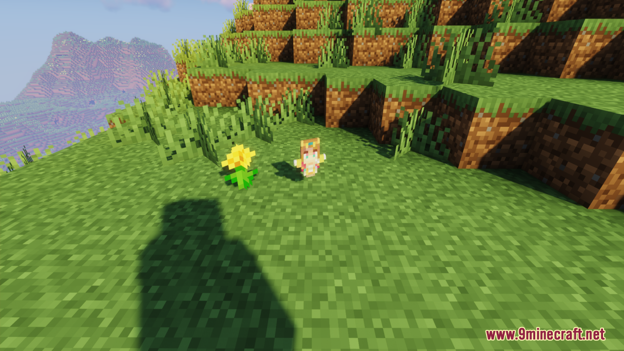 Zelda Totem of Undying Resource Pack Screenshot 8 A custom princess totem item dropped on the grass near a yellow flower