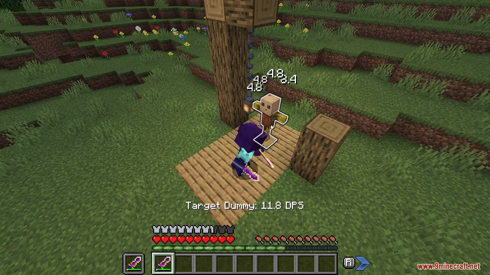 The dummy wearing a cape while being hit