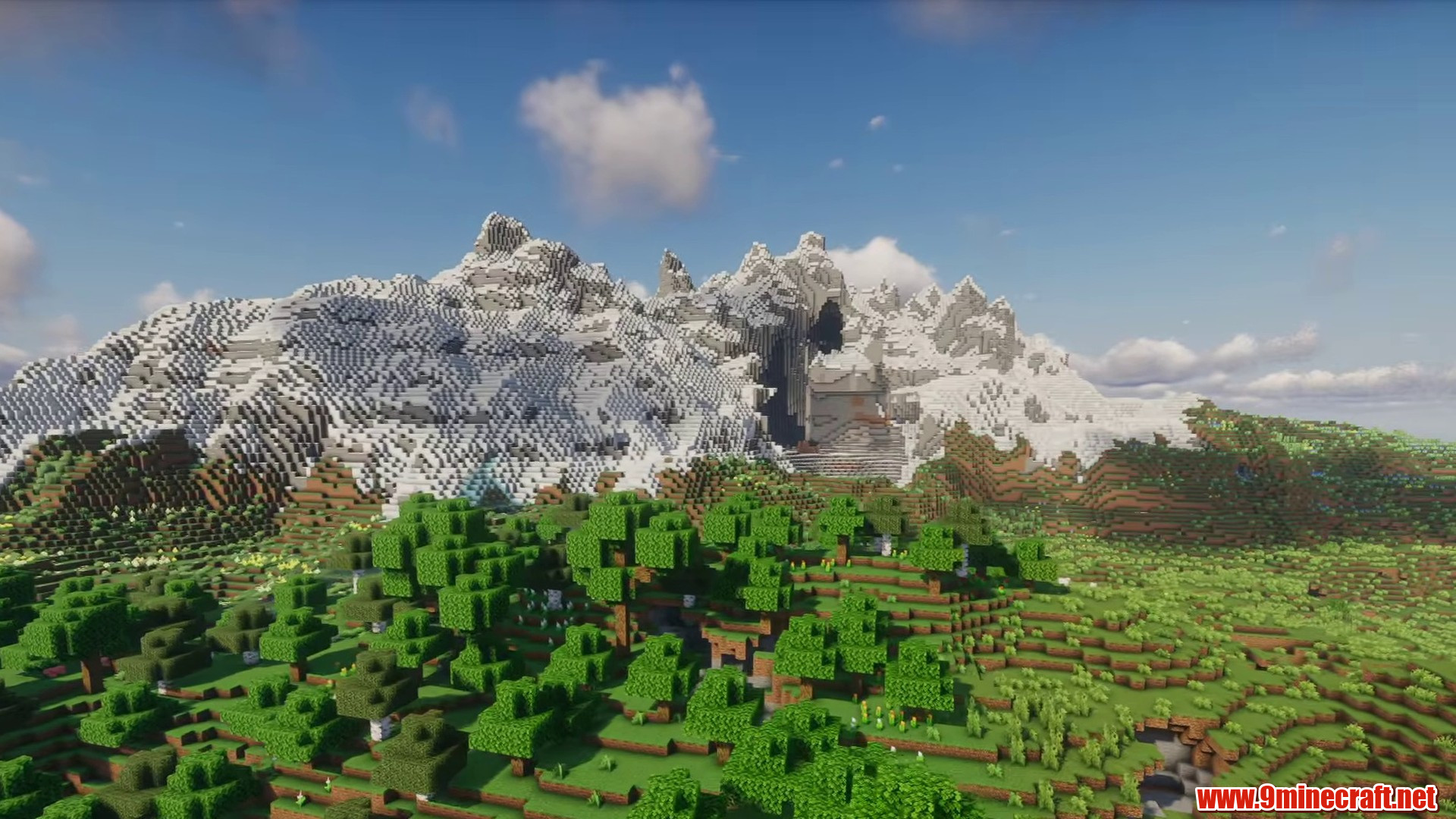 Flat valley below snowy mountains in Minecraft seed -3018609527814228694